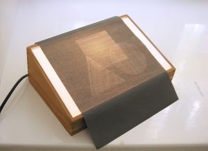 Júlia VÉCSEI: Object, 2011, carbon paper drawing on paper, lightbox, 17x26,5x10 cm